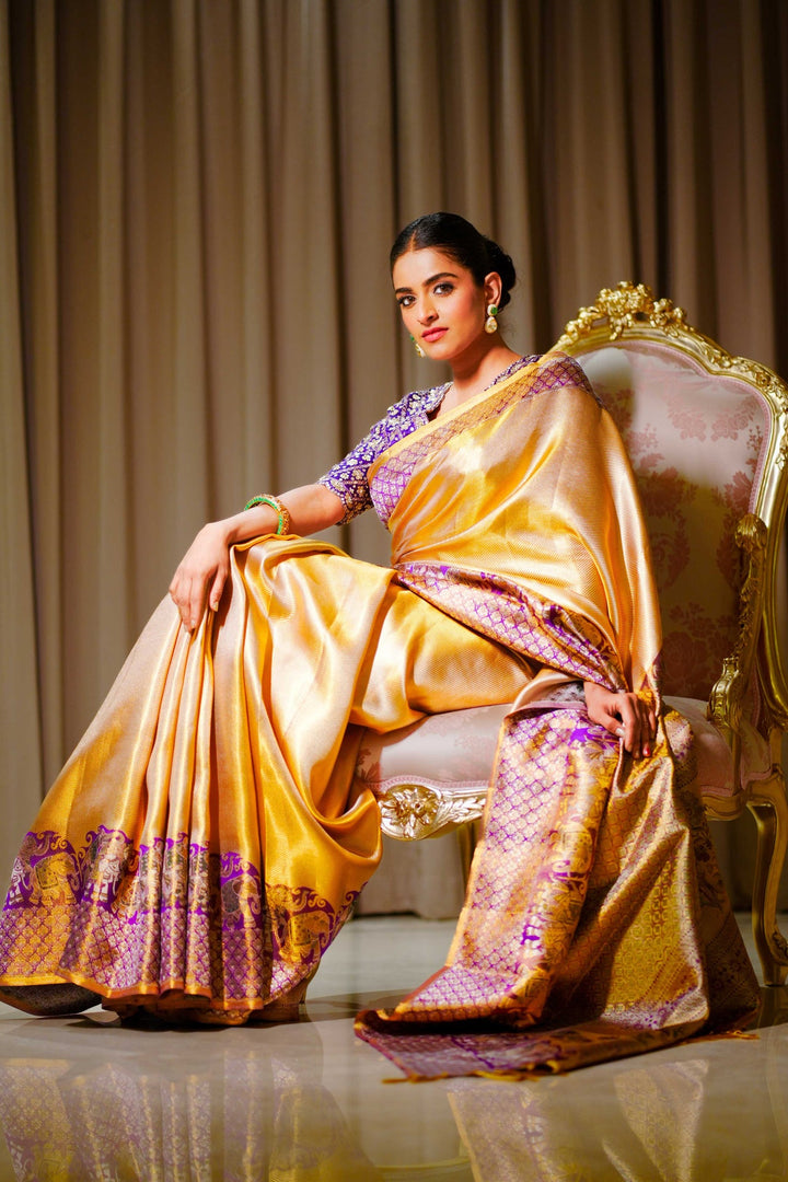 Neerus Purple silk woven saree with blouse piece - back view