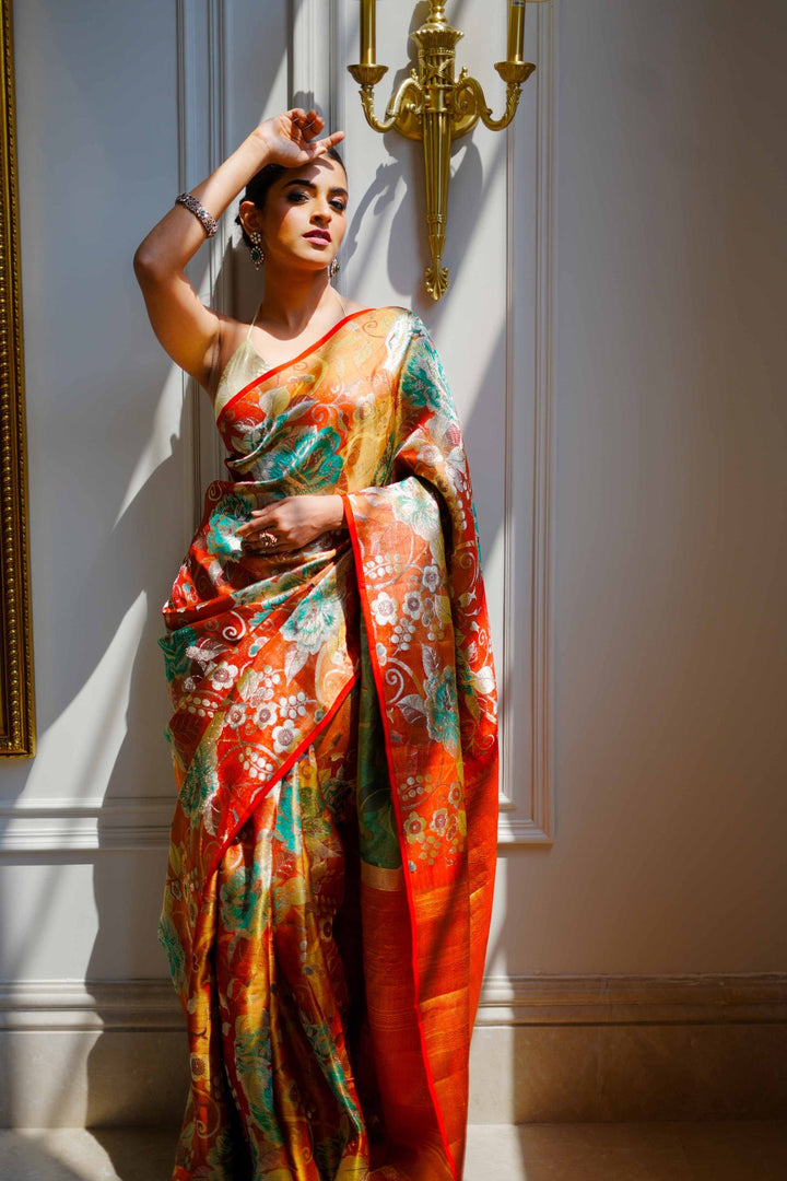 Neerus Orange silk woven saree - back view
