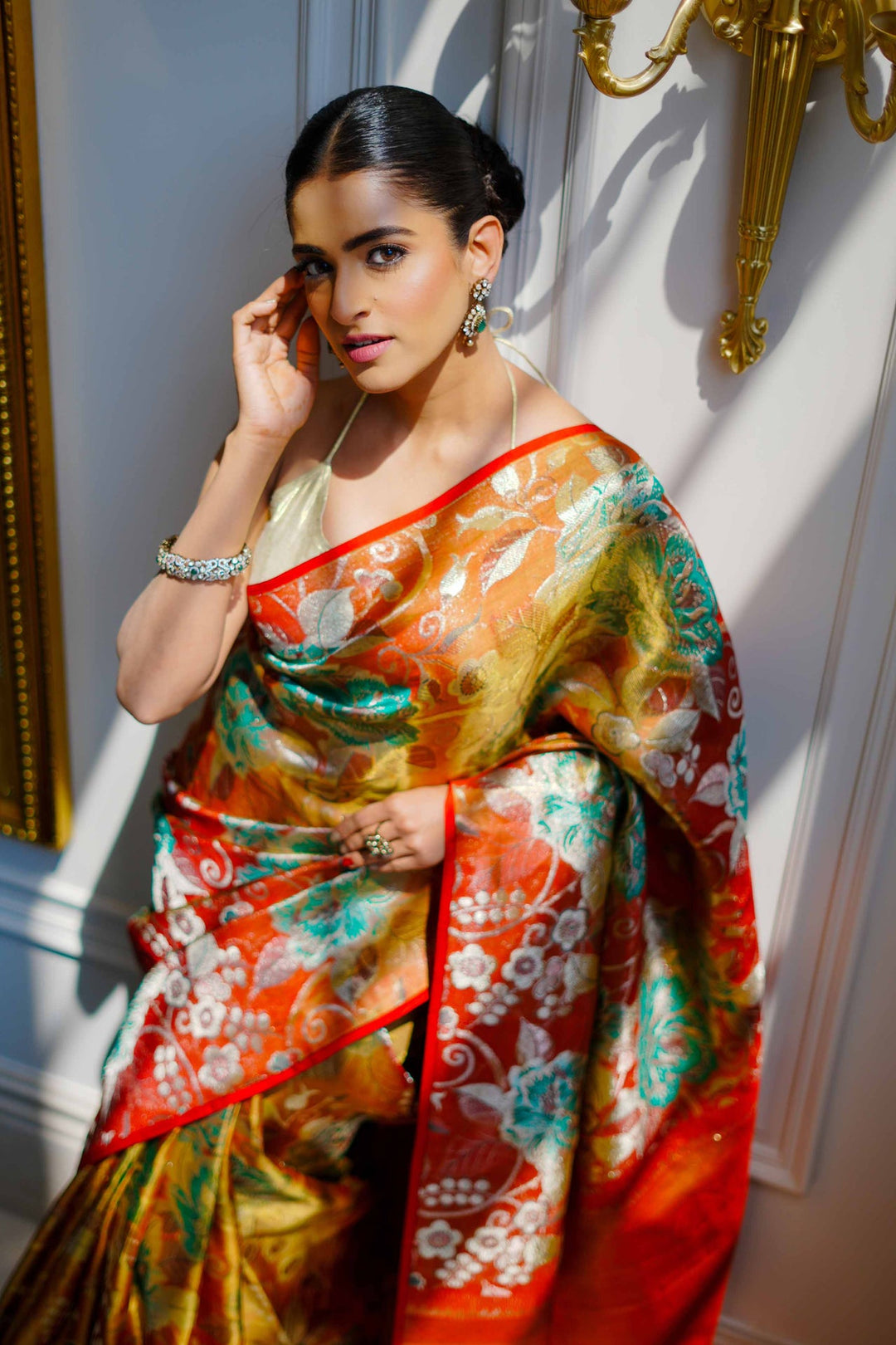 Neerus Orange silk woven saree - side view