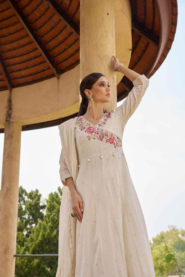 Neerus White cotton embroidered Anarkali suit set - side view