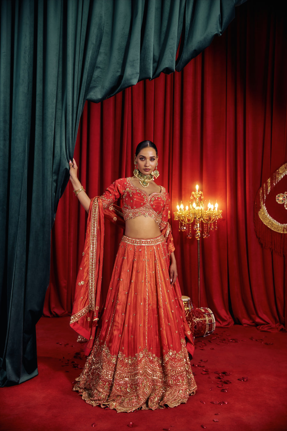 Neerus Red tissue hand embroidered lehenga set - side view