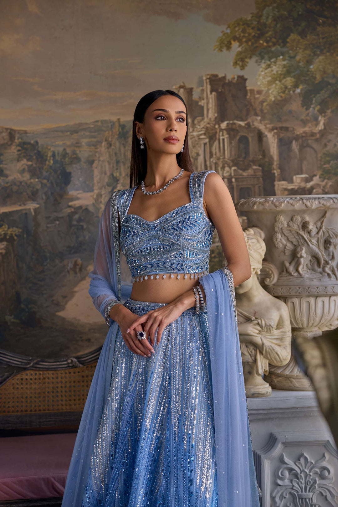 Neerus Blue net hand embroidered lehenga set - side view