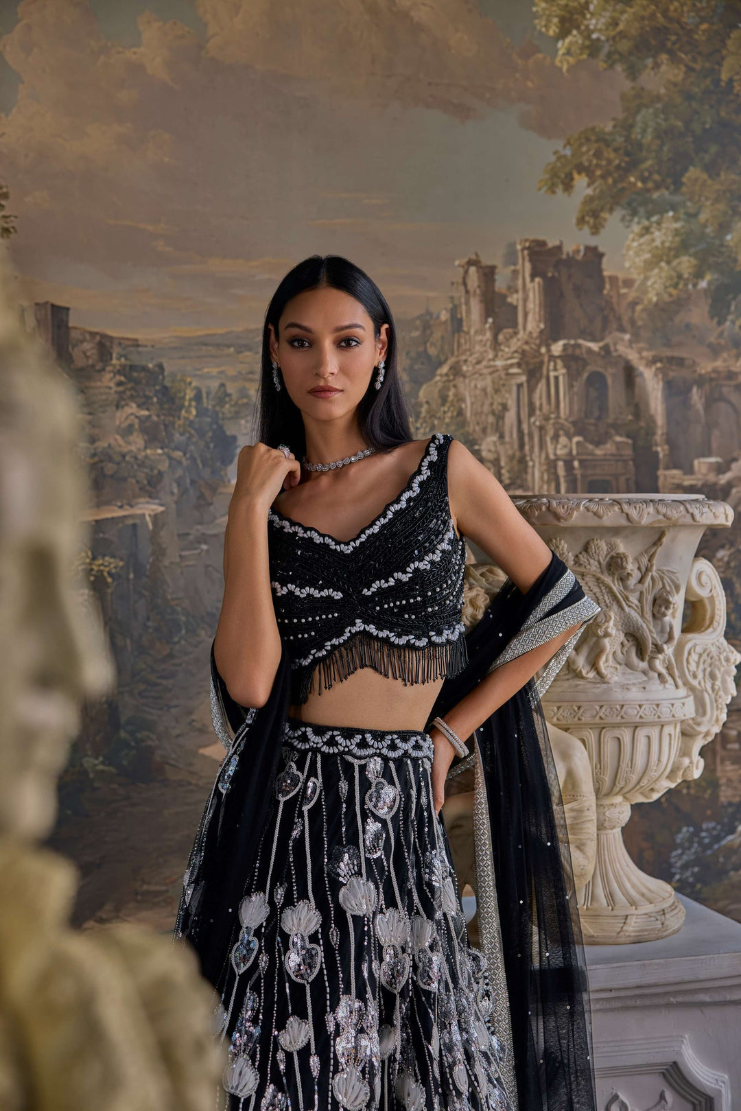 Neerus Black net hand embroidered lehenga set - side view