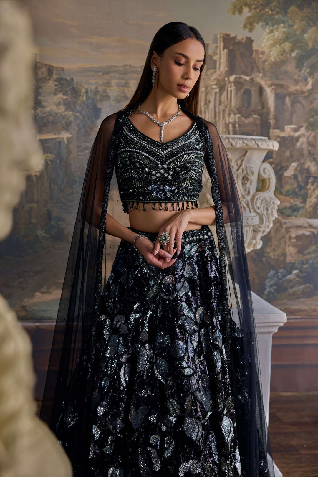 Neerus Black net embellished lehenga set - side view