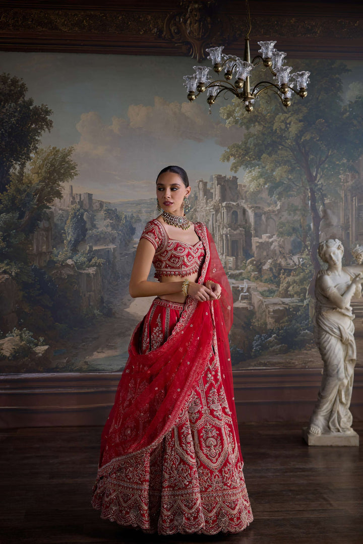 Neerus Red silk hand embroidered bridal lehenga set - front view