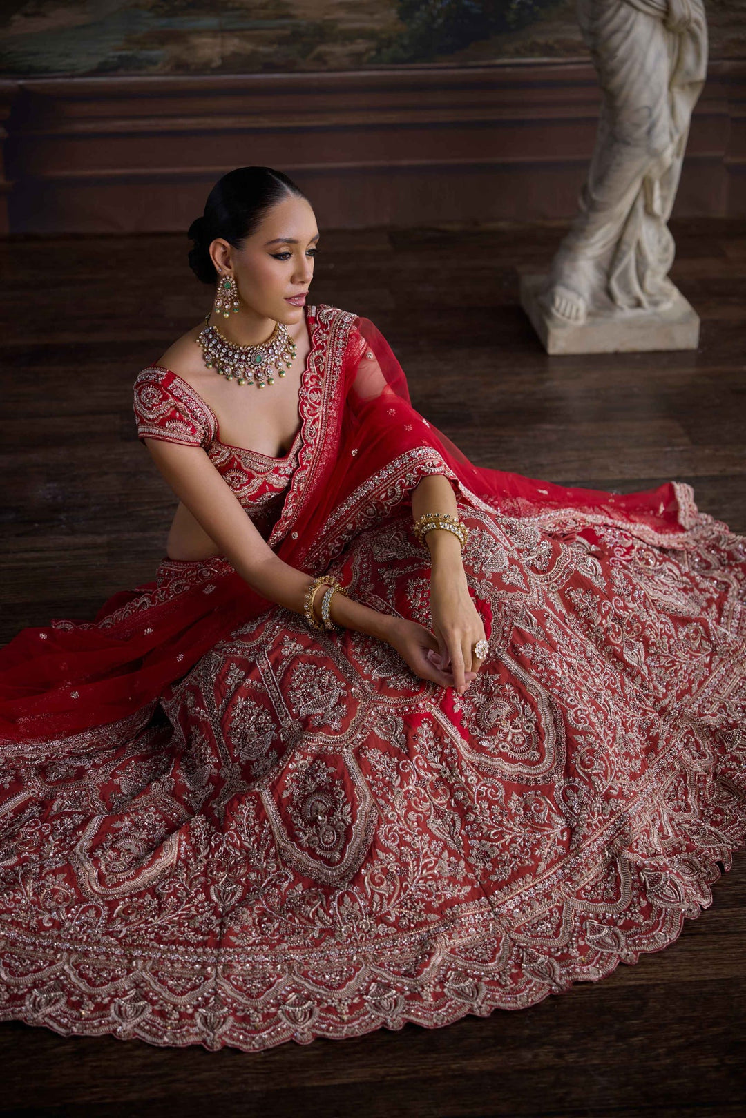 Neerus Red silk hand embroidered bridal lehenga set - back view