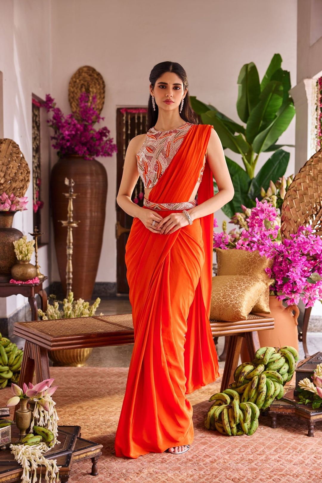 Neerus Orange crepe embroidered drape saree - back view