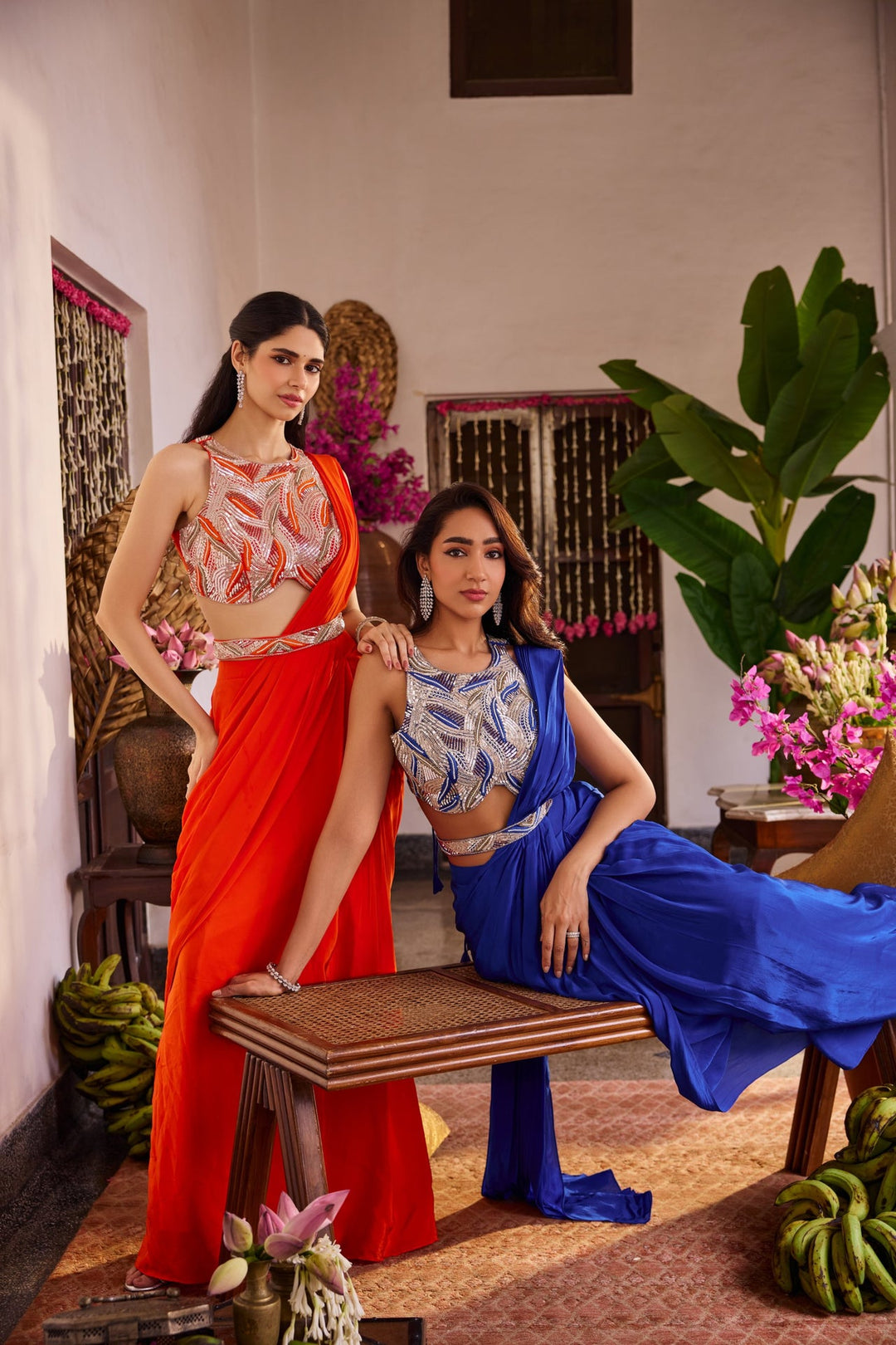 Neerus Blue crepe embroidered drape saree - side view