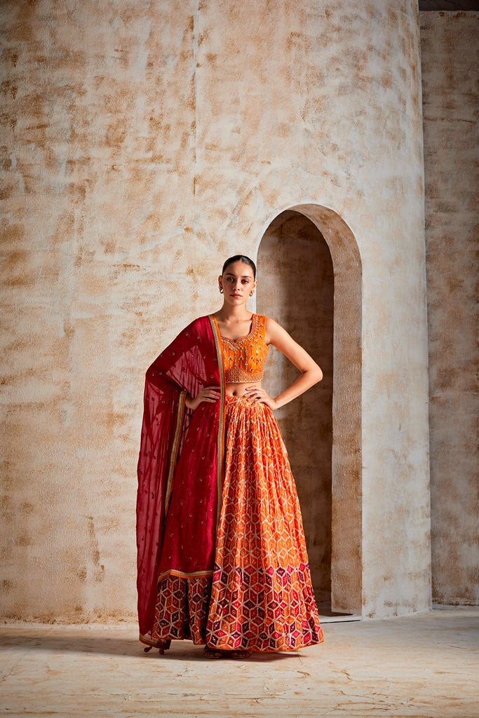 Neerus Orange Chinon flared lehenga set - front view