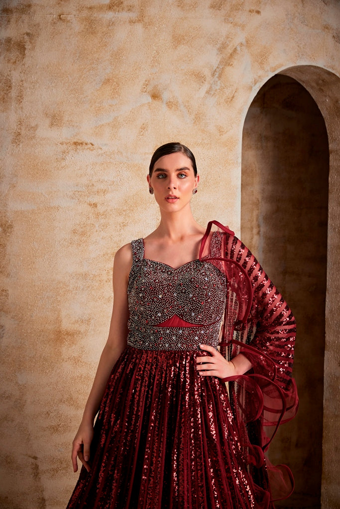 Neerus Maroon net embroidered gown - side view