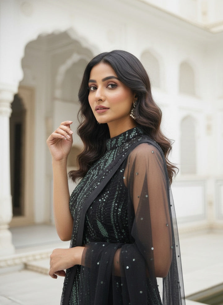 Neerus Black net embellished kurta palazzo suit set - side view