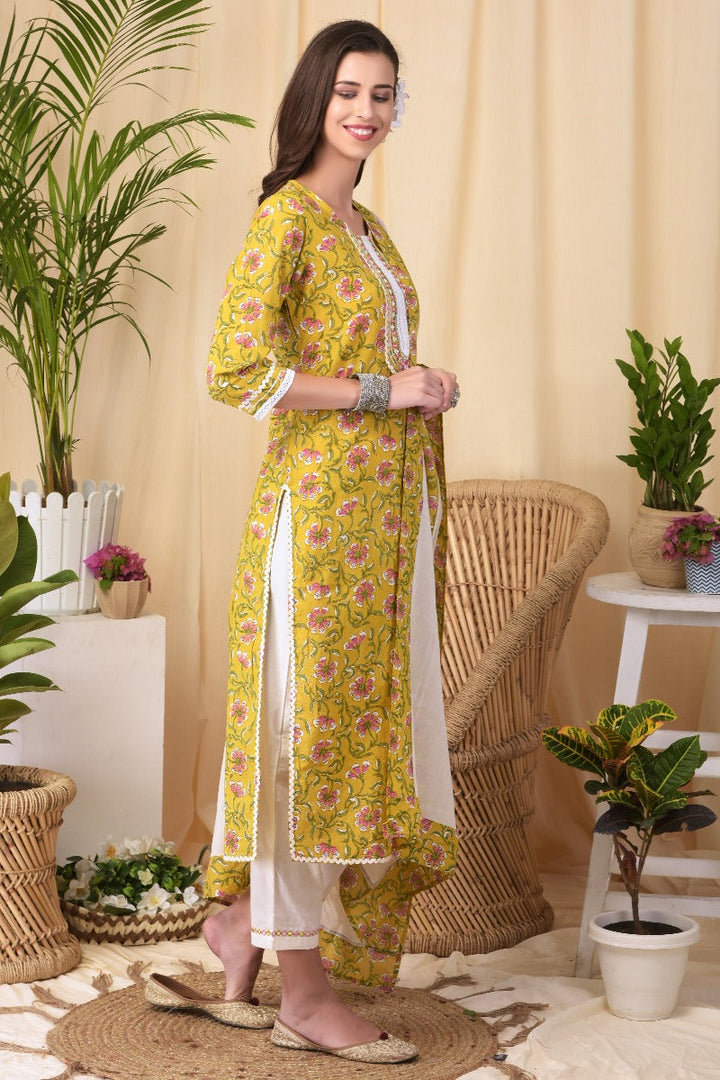 Neerus Yellow cotton kurta set with dupatta - back view