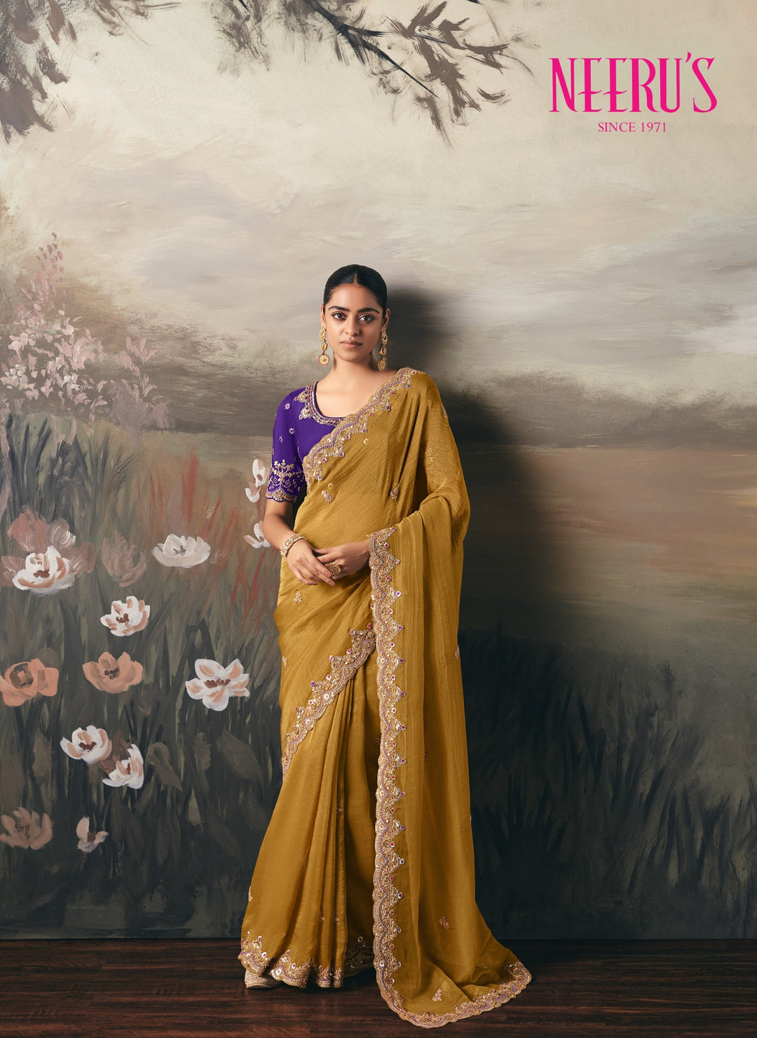 Neerus Yellow tissue embellished saree - front view