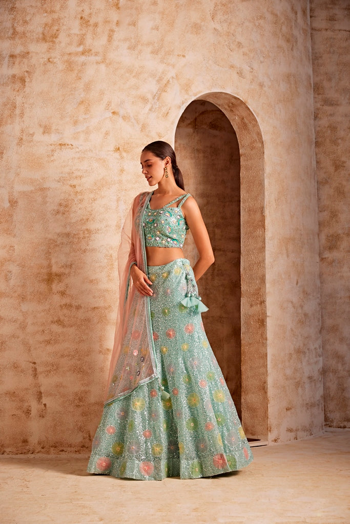 Neerus Green net embellished lehenga set - side view