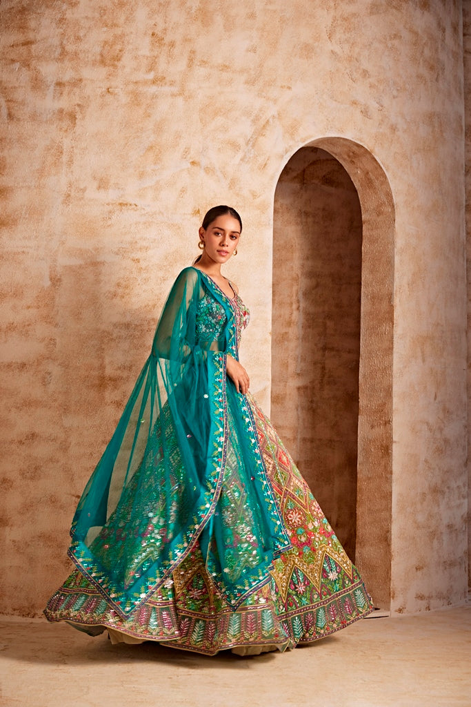 Neerus Green net embellished lehenga ghagra set - side view