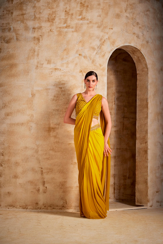 Neerus Yellow georgette drape saree - front view