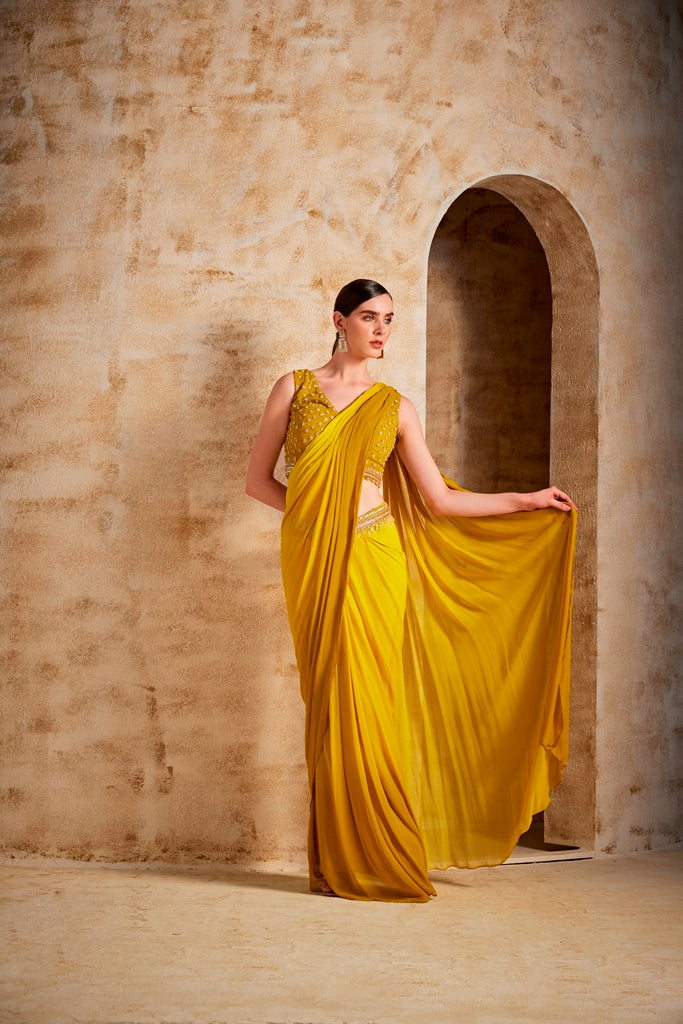 Neerus Yellow georgette drape saree - back view