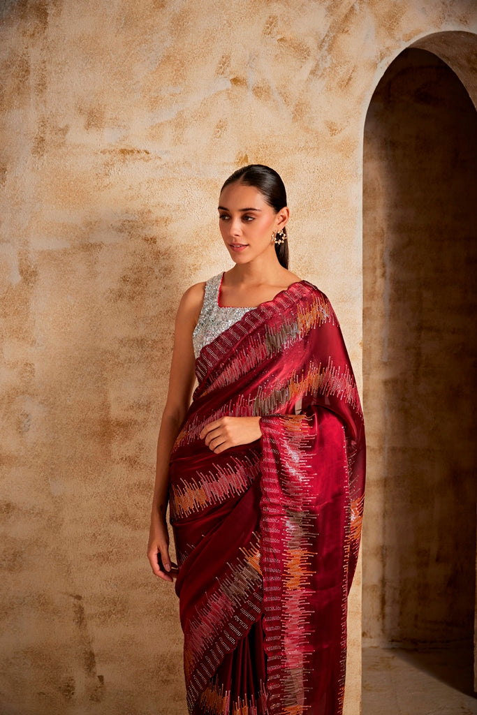 Neerus Maroon silk embellished saree - back view