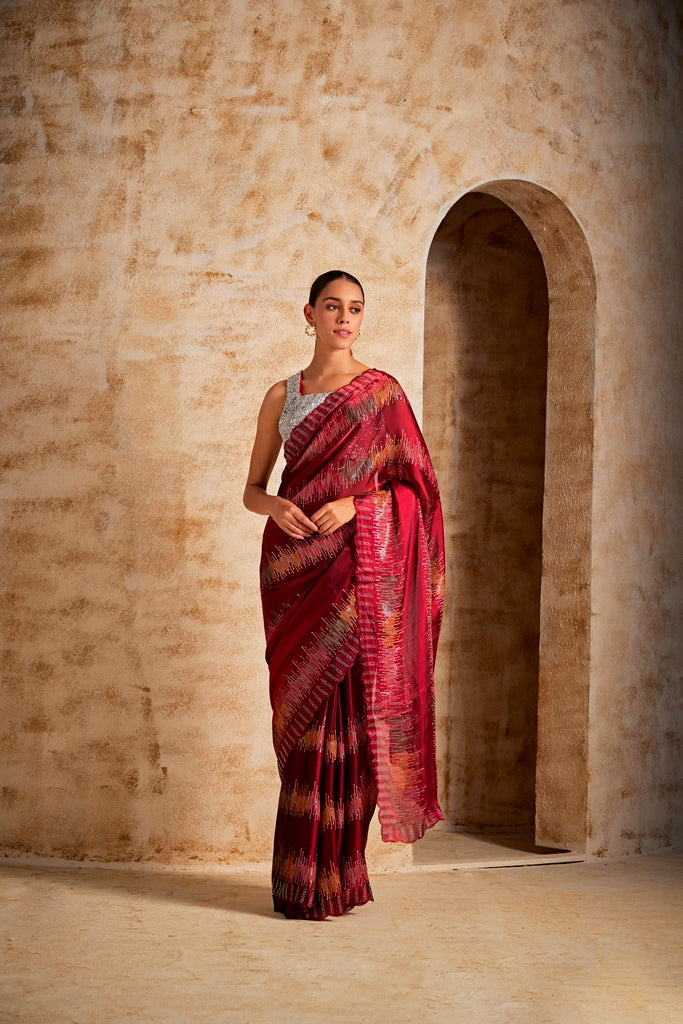 Neerus Maroon silk embellished saree - front view