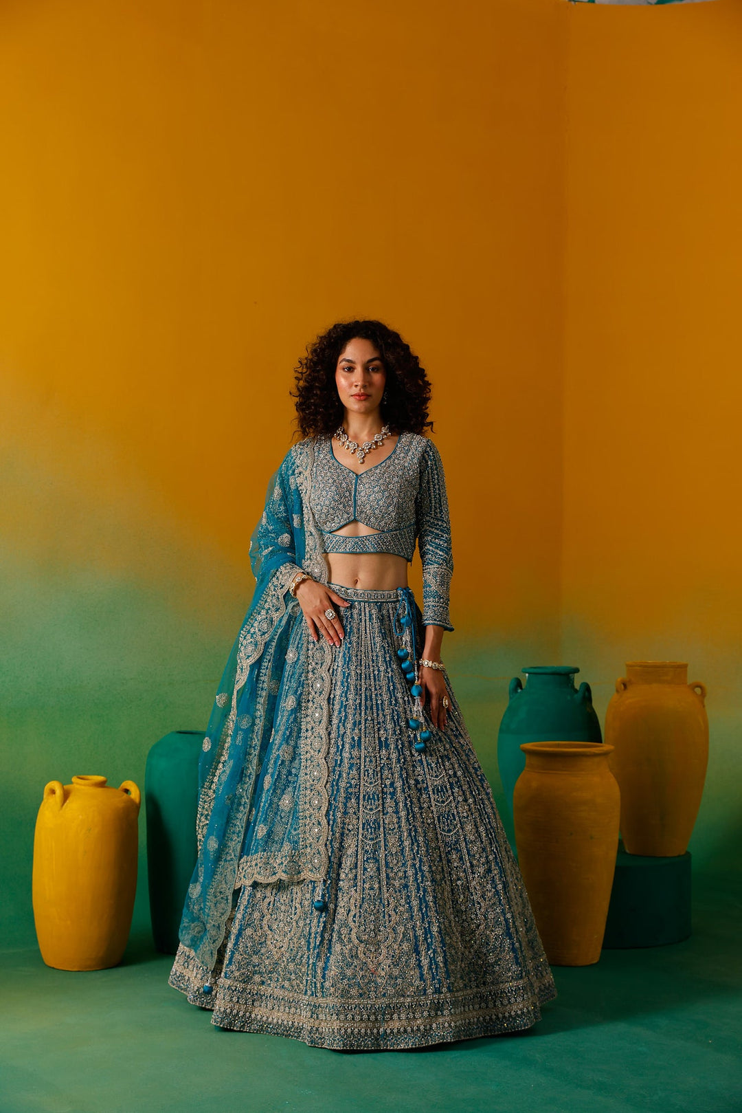 Neerus Green net embroidered lehenga set - side view