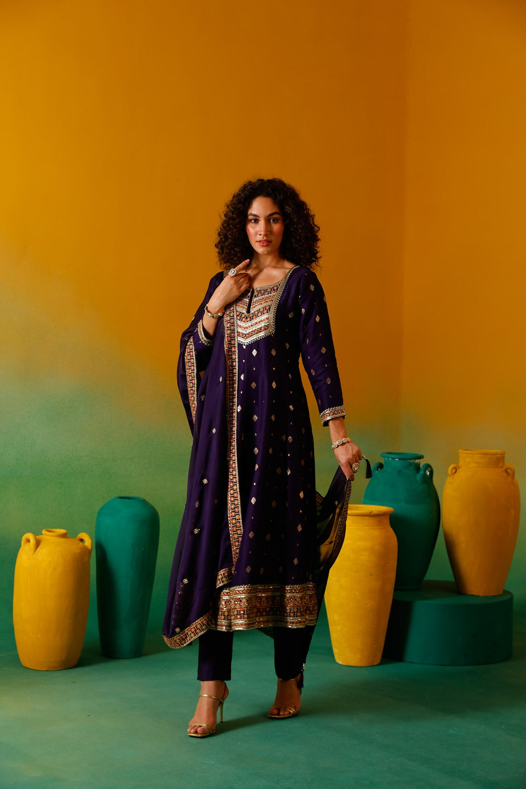 Neerus Purple silk embroidered anarkali suit set - side view
