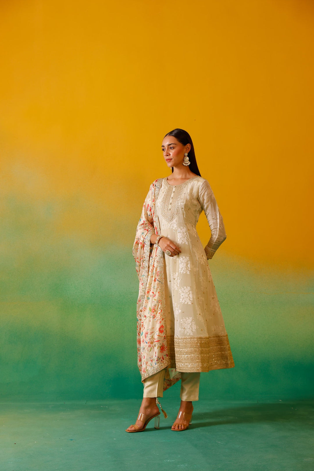 Neerus Beige tissue embroidered anarkali suit set - side view