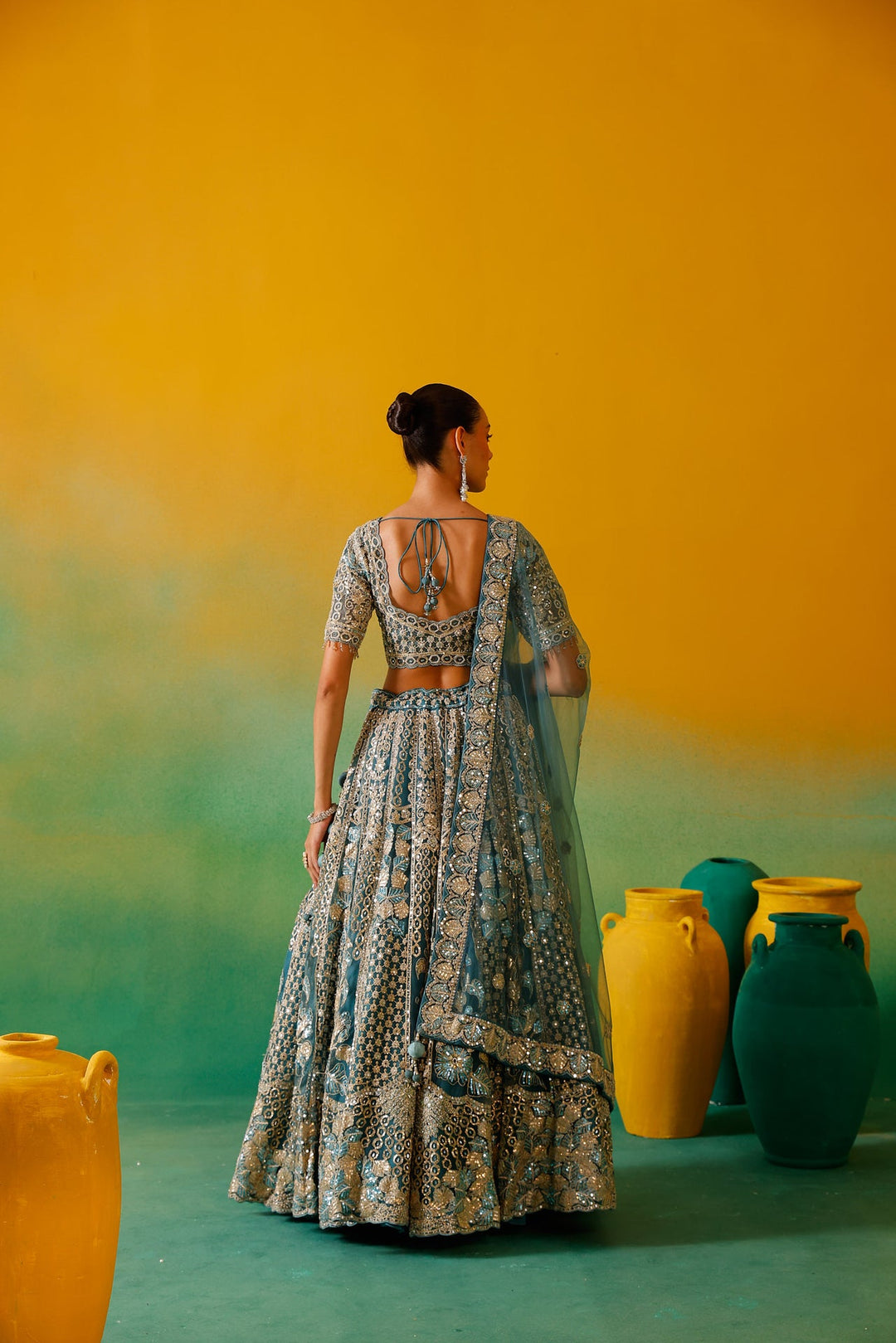 Neerus Blue net embroidered lehenga set - back view