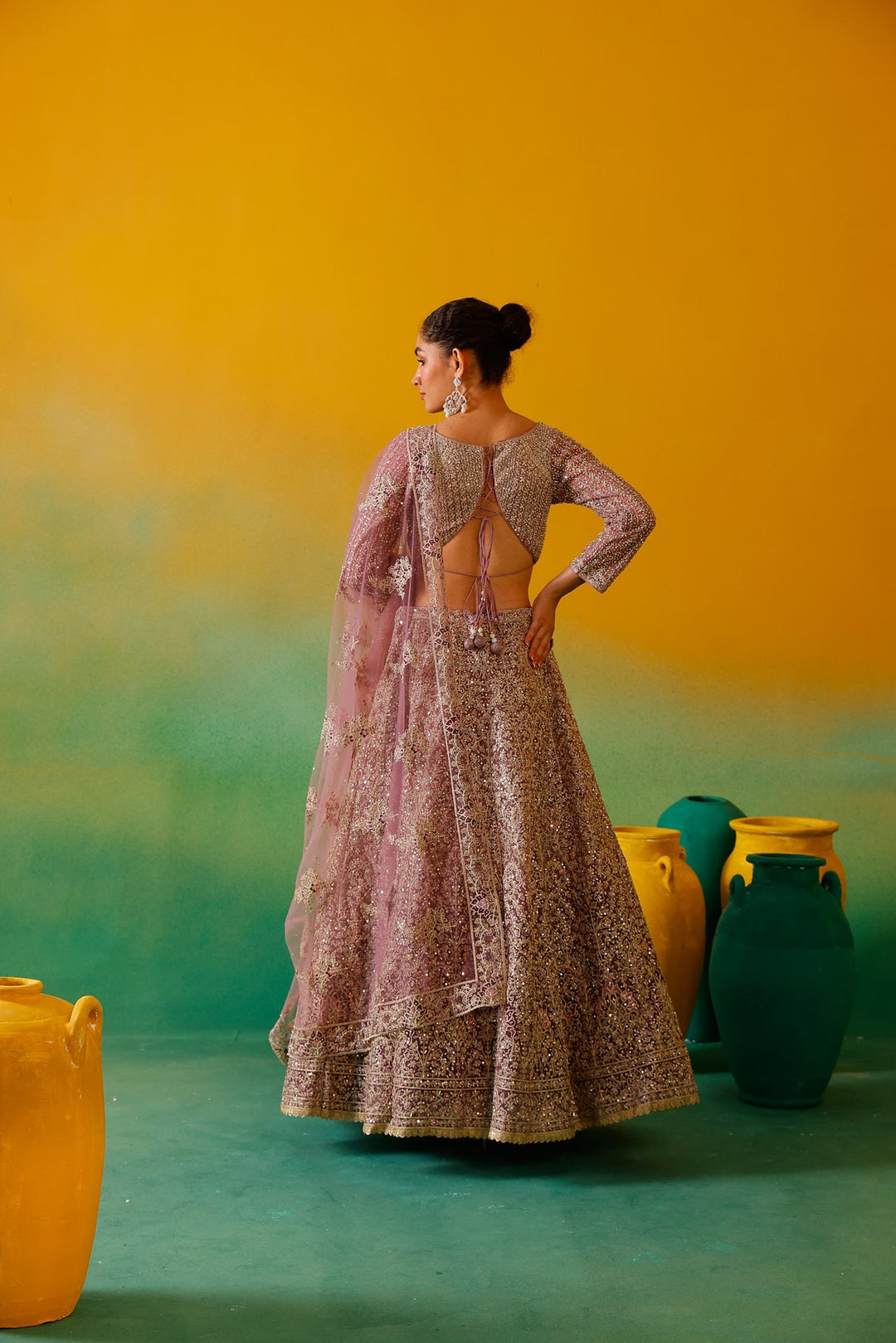 Neerus Purple net embroidered lehenga set - back view