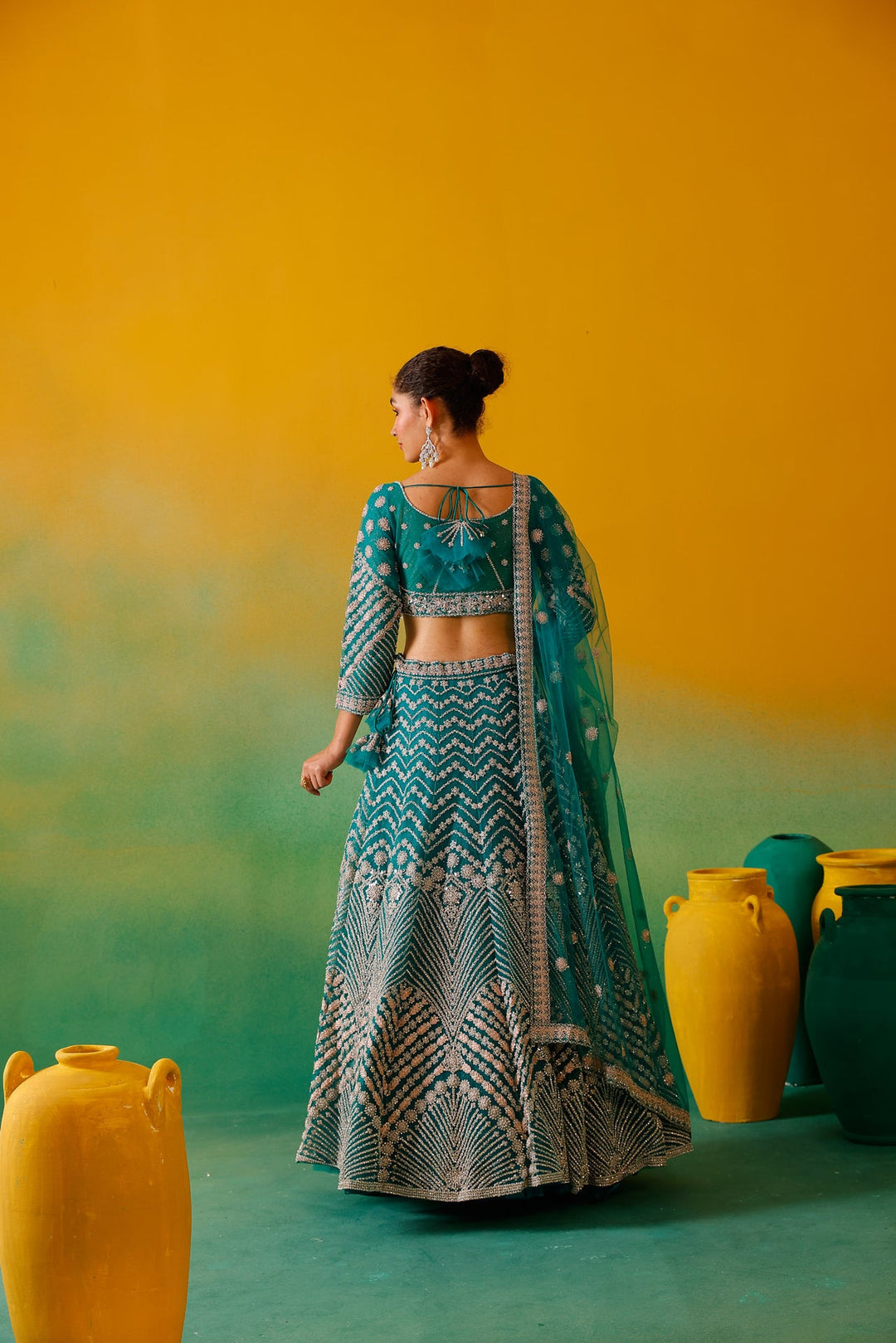 Neerus Green net embroidered lehenga set - back view